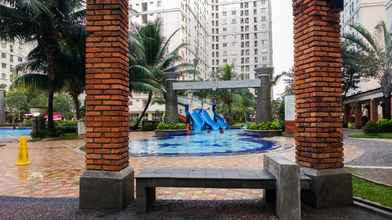 Swimming Pool 4 Comfy Cozy 2BR Green Palace Kalibata City Apartment By Travelio