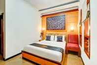 Bedroom Collection O 90000 Adya Nalendra Boutique Hotel