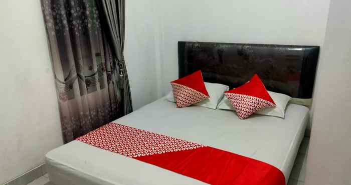 Kamar Tidur OYO 3919 Karmila Syariah Guest House