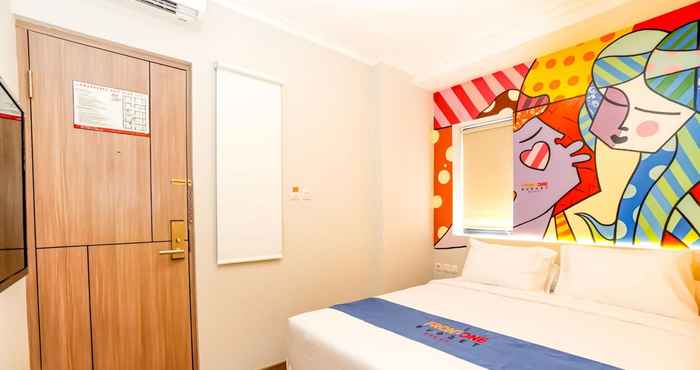 ห้องนอน Front One Budget Hotel Bekasi