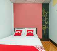 Kamar Tidur 4 OYO 608 Maleena Home