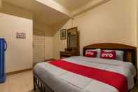 ห้องนอน OYO 583 Sweethome Guest House