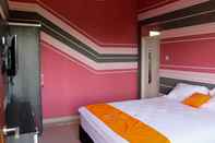 Kamar Tidur OYO 90011 The Arsy Syariah Guest House