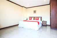 Kamar Tidur OYO 383 White Inn Hotel 