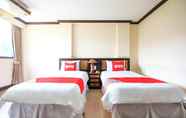 Bilik Tidur 5 OYO 383 White Inn Hotel 