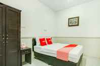 Bedroom OYO 3957 Boarding House Boss 