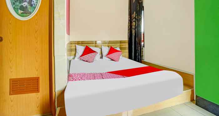 Kamar Tidur OYO 90161 Hotel Lendosis Pipa Reja Angkatan 66