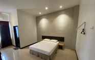 Kamar Tidur 6 Familia Hotel