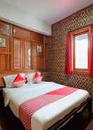 BEDROOM OYO 4016 Tan Jokteng Guest House