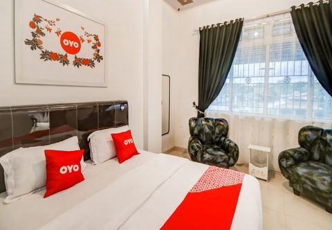 Bedroom OYO 89995 Damai Guest House