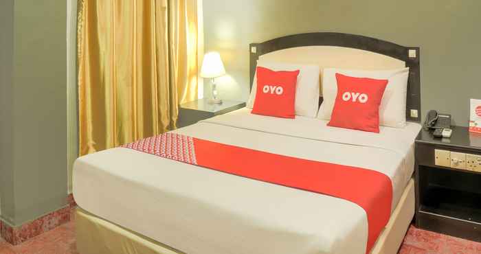 Bedroom OYO 90005 Sydney Hotel