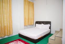 Bedroom OYO 90115 Citra Kadok Hotel & Banquet Hall