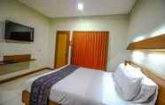 Kamar Tidur 4 Opulence Paradiso Beach Inn Hotel