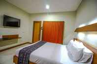 Bedroom Opulence Paradiso Beach Inn Hotel