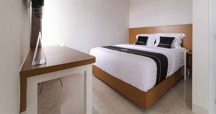 Kamar Tidur Super OYO Collection O 90023 Damar Kusumo Guest House