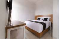 Kamar Tidur Super OYO Collection O 90023 Damar Kusumo Guest House