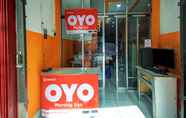 Lobi 4 OYO 90032 Worship Usu