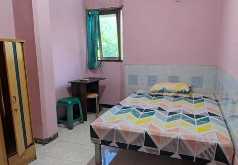 Bedroom OYO 90036 Griya Koe