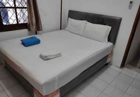 Bedroom OYO 90038 Ragunan Guesthouse Syariah