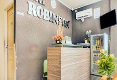 Lobi 5 OYO 90002 Wisma Robinson