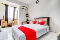 Kamar Tidur OYO 90042 Emerald Towers