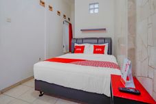 Phòng ngủ OYO 90035 Merci Club