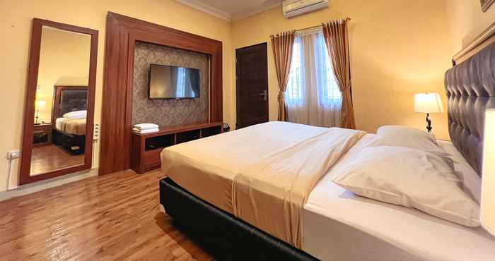 Bedroom Lucky Guest House Wahid Hasyim 