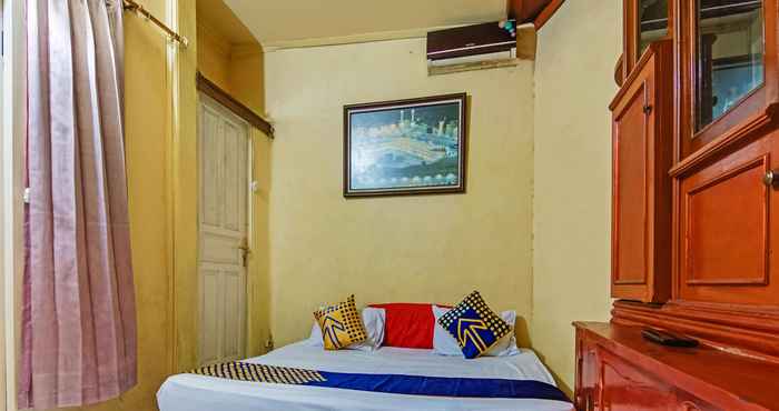 Bedroom SPOT ON 90060 Jq Homestay Syariah