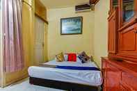 Bedroom SPOT ON 90060 Jq Homestay Syariah