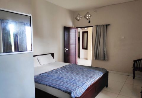 Bedroom OYO 90096 Hotel Tiana