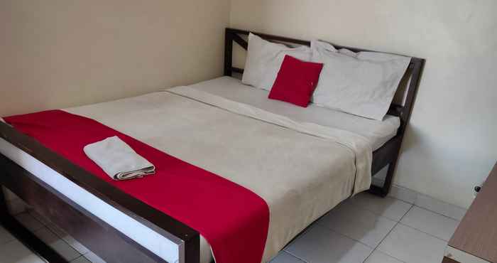 Kamar Tidur OYO 90107 Semanggi Mulia Residence