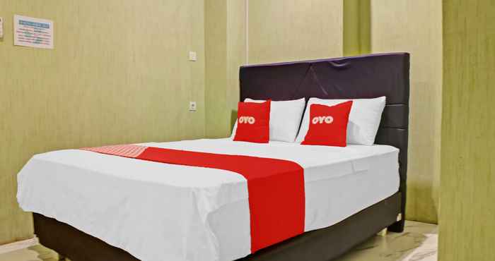 Phòng ngủ Super OYO 90112 Hotel Permata Inn