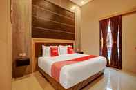 Bedroom Capital O 90070 Giri Palma Villas