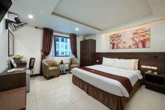 Kamar Tidur 4 Quang Chung Hotel