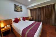 ห้องนอน Manohara Hotel