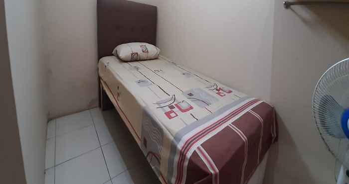 Kamar Tidur OYO 90145 Furqon Guest House Syariah