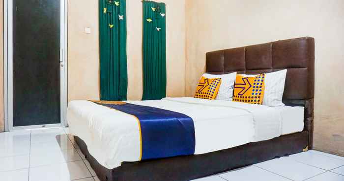 Kamar Tidur SPOT ON 90146 Sugianto Guesthouse Syariah