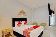 Bedroom OYO 90155 Landuh Merta Residence