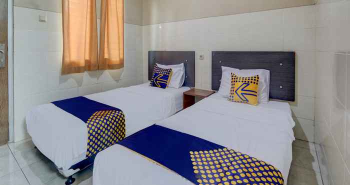 Kamar Tidur OYO Life 90159 Puri Asoka Guest House