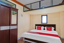 ห้องนอน OYO 90139 Arival Homestay Syariah