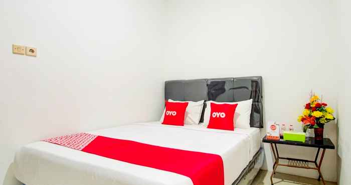 Bedroom OYO 90138 Dear Darlin Villa - Family Stay