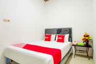 Bilik Tidur OYO 90138 Dear Darlin Villa - Family Stay