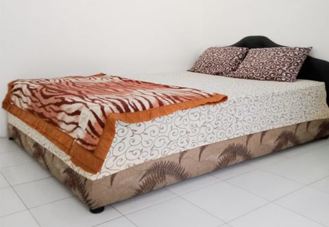 Bedroom OYO 90137 Alun Alun Homestay