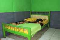 Kamar Tidur Penginapan 99