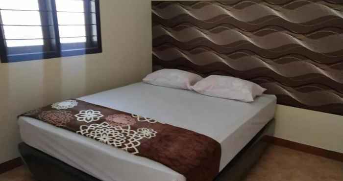 Kamar Tidur SPOT ON 90135 Thalia Residence