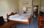 Kamar Tidur 5 Pueng Luang Hotel