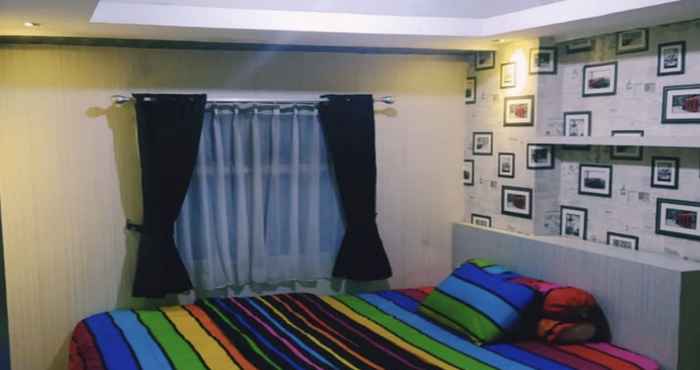 Bedroom OYO 93424 Apartemen The Suite Metro By Salman 