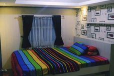 침실 OYO 93424 Apartemen The Suite Metro By Salman