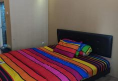 침실 4 OYO 93424 Apartemen The Suite Metro By Salman