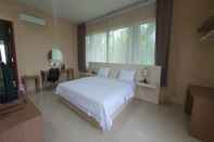 ห้องนอน Capital O 90192 Hotel Pcp Trawas